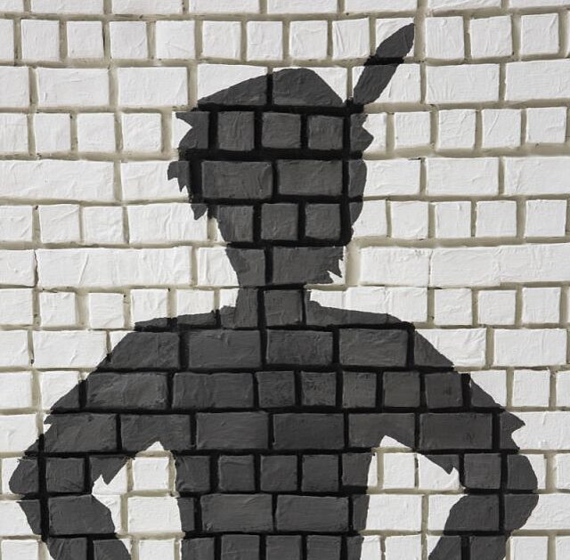 Bild Silhouette Figur mit Feder am Hut