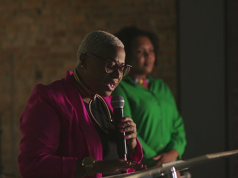 black woman preaching